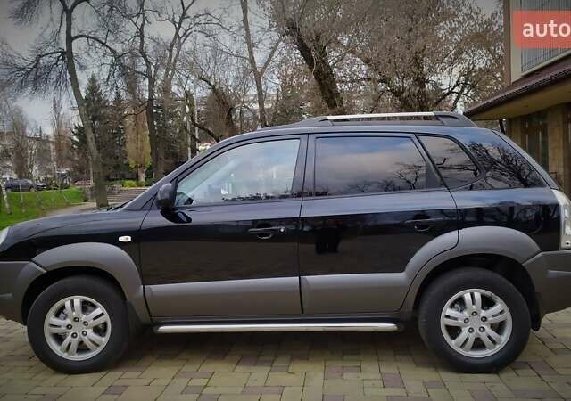 Чорний Хендай Туксон, об'ємом двигуна 2 л та пробігом 229 тис. км за 8600 $, фото 53 на Automoto.ua