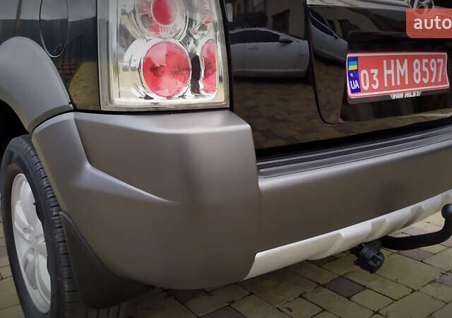 Чорний Хендай Туксон, об'ємом двигуна 2 л та пробігом 229 тис. км за 8600 $, фото 80 на Automoto.ua