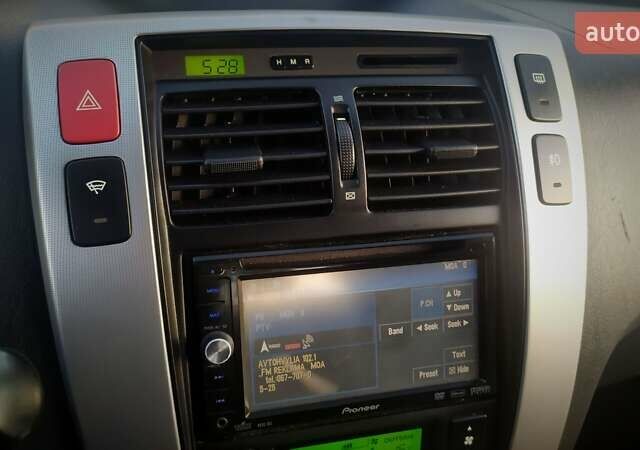 Черный Хендай Туксон, объемом двигателя 2 л и пробегом 230 тыс. км за 8600 $, фото 168 на Automoto.ua