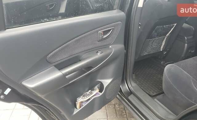 Чорний Хендай Туксон, об'ємом двигуна 1.98 л та пробігом 172 тис. км за 9300 $, фото 5 на Automoto.ua