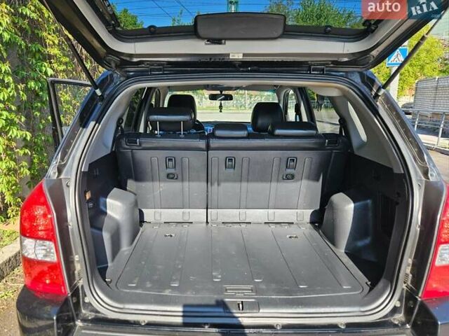 Чорний Хендай Туксон, об'ємом двигуна 2 л та пробігом 152 тис. км за 7950 $, фото 9 на Automoto.ua