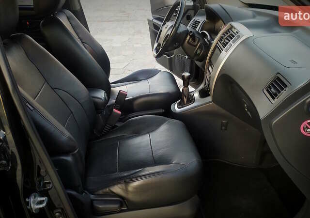 Черный Хендай Туксон, объемом двигателя 2 л и пробегом 230 тыс. км за 8600 $, фото 152 на Automoto.ua