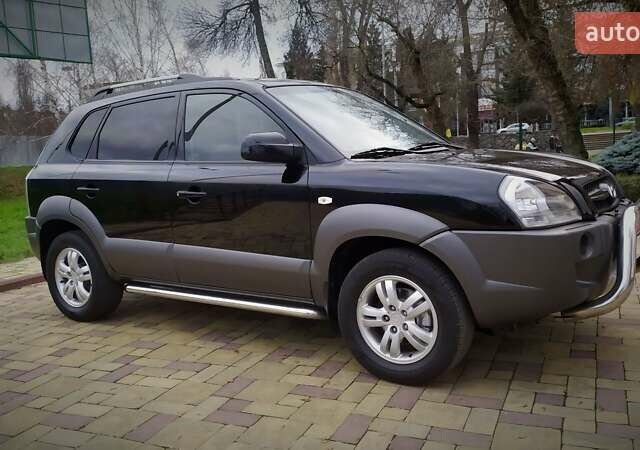 Чорний Хендай Туксон, об'ємом двигуна 2 л та пробігом 229 тис. км за 8600 $, фото 21 на Automoto.ua