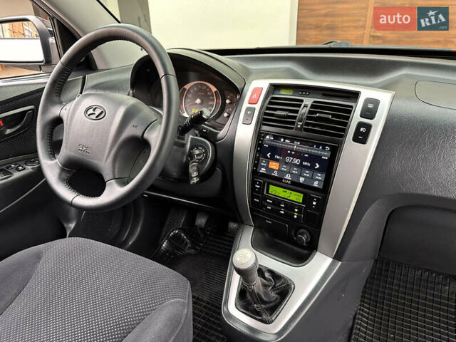 Хендай Туксон 2007 в Ужгороде на Automoto.ua Черный Хендай Туксон, объемом двигателя 1.98 л и пробегом 157 тыс. км за 7300 $, фото 30 на Automoto.ua