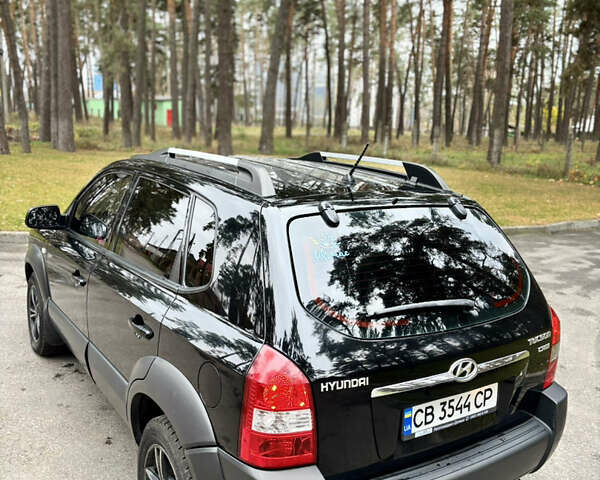 Черный Хендай Туксон, объемом двигателя 1.99 л и пробегом 266 тыс. км за 7500 $, фото 15 на Automoto.ua