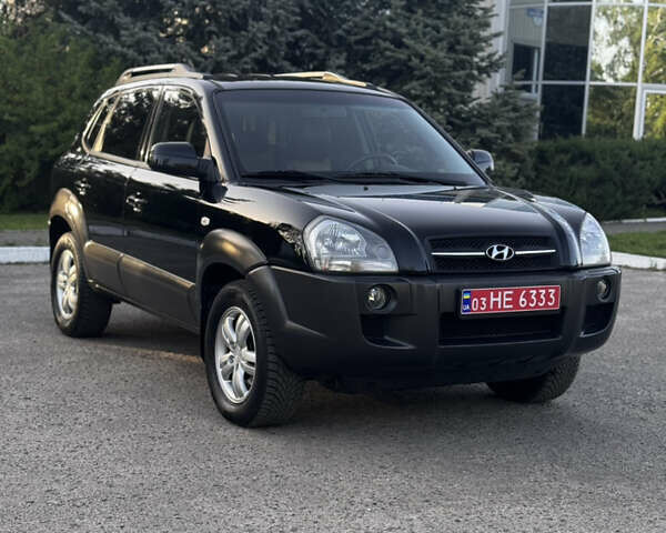 Черный Хендай Туксон, объемом двигателя 2 л и пробегом 239 тыс. км за 7850 $, фото 10 на Automoto.ua