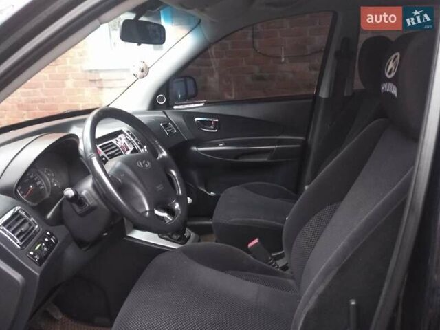 Чорний Хендай Туксон, об'ємом двигуна 1.98 л та пробігом 193 тис. км за 8000 $, фото 4 на Automoto.ua