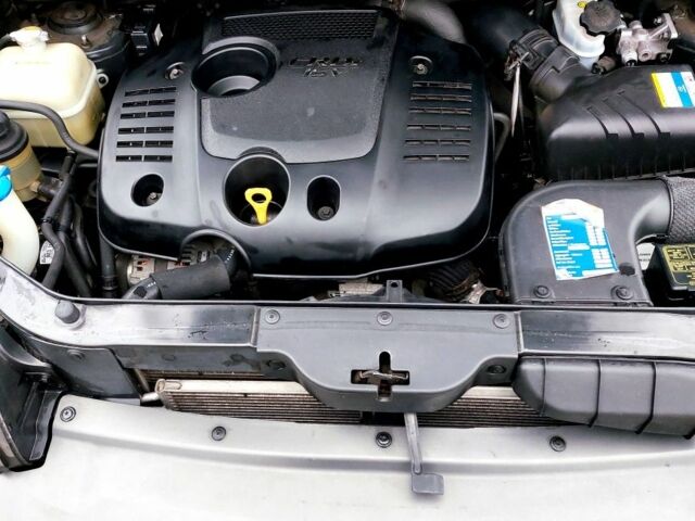 Черный Хендай Туксон, объемом двигателя 2 л и пробегом 272 тыс. км за 7500 $, фото 16 на Automoto.ua