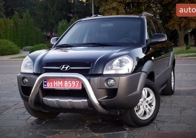 Черный Хендай Туксон, объемом двигателя 2 л и пробегом 230 тыс. км за 8600 $, фото 91 на Automoto.ua