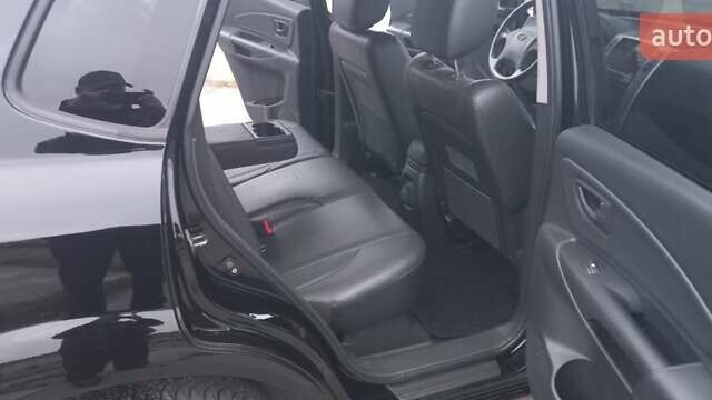 Черный Хендай Туксон, объемом двигателя 1.98 л и пробегом 155 тыс. км за 7999 $, фото 46 на Automoto.ua