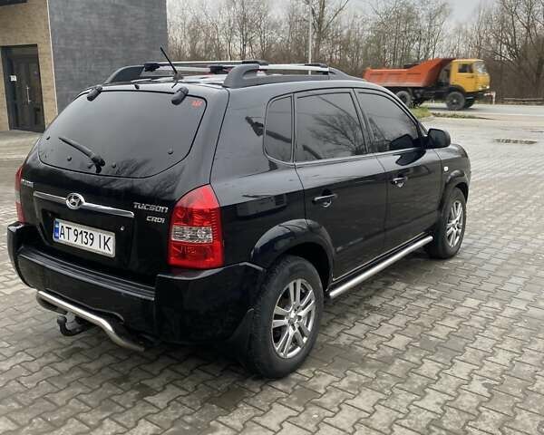 Чорний Хендай Туксон, об'ємом двигуна 1.99 л та пробігом 345 тис. км за 7600 $, фото 5 на Automoto.ua