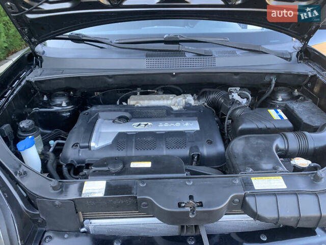 Чорний Хендай Туксон, об'ємом двигуна 2 л та пробігом 56 тис. км за 9500 $, фото 26 на Automoto.ua