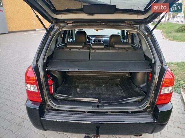 Чорний Хендай Туксон, об'ємом двигуна 1.98 л та пробігом 192 тис. км за 7950 $, фото 44 на Automoto.ua