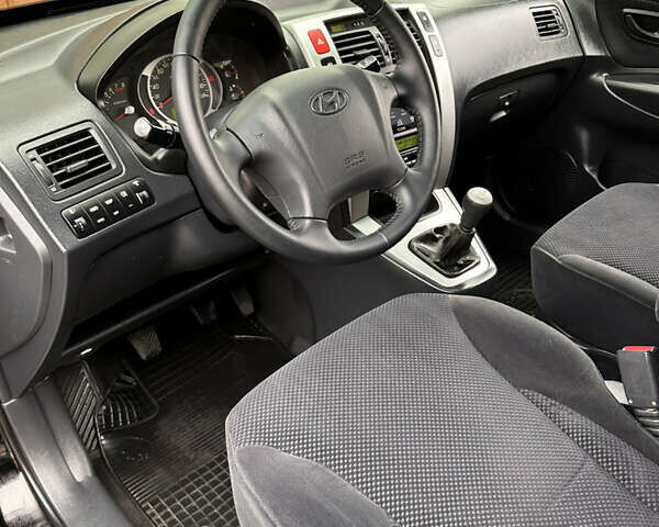 Хендай Туксон 2007 в Ужгороде на Automoto.ua Черный Хендай Туксон, объемом двигателя 1.98 л и пробегом 157 тыс. км за 7300 $, фото 41 на Automoto.ua