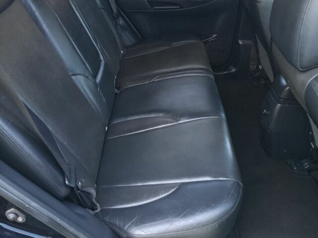 Черный Хендай Туксон, объемом двигателя 2 л и пробегом 192 тыс. км за 7950 $, фото 9 на Automoto.ua