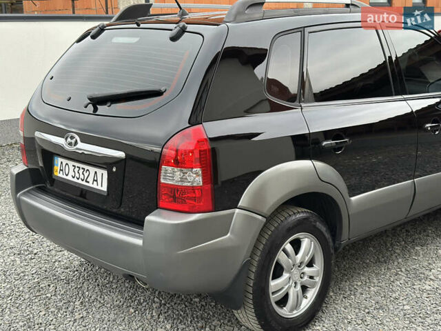 Хендай Туксон 2007 в Ужгороде на Automoto.ua Черный Хендай Туксон, объемом двигателя 1.98 л и пробегом 157 тыс. км за 7300 $, фото 16 на Automoto.ua