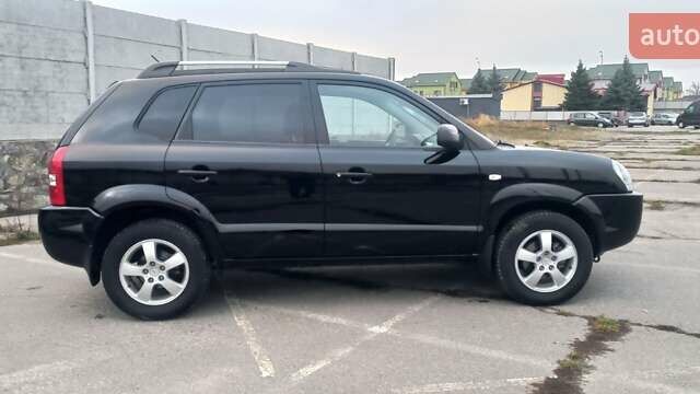 Черный Хендай Туксон, объемом двигателя 1.98 л и пробегом 155 тыс. км за 7999 $, фото 6 на Automoto.ua