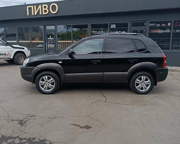 Черный Хендай Туксон, объемом двигателя 2 л и пробегом 255 тыс. км за 8400 $, фото 15 на Automoto.ua