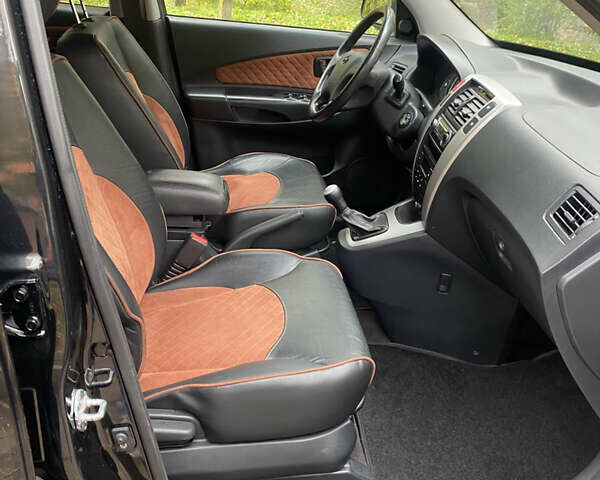 Черный Хендай Туксон, объемом двигателя 2 л и пробегом 178 тыс. км за 7860 $, фото 18 на Automoto.ua