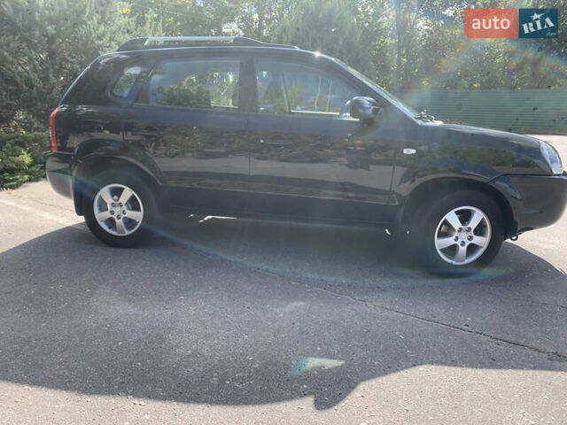 Чорний Хендай Туксон, об'ємом двигуна 2 л та пробігом 56 тис. км за 9500 $, фото 29 на Automoto.ua