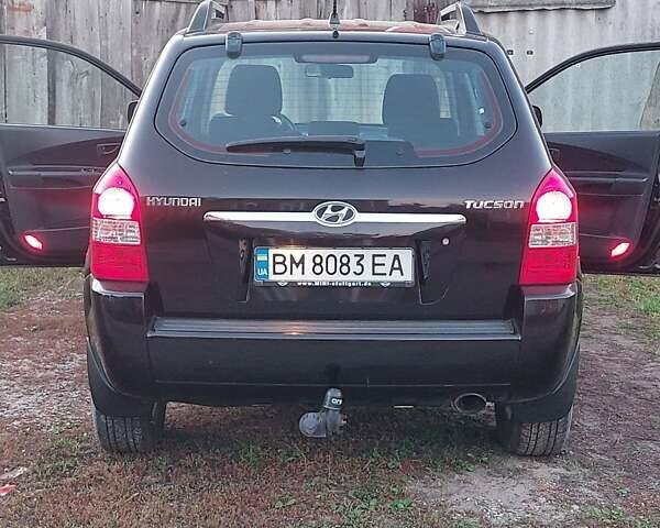 Черный Хендай Туксон, объемом двигателя 1.98 л и пробегом 200 тыс. км за 7100 $, фото 7 на Automoto.ua