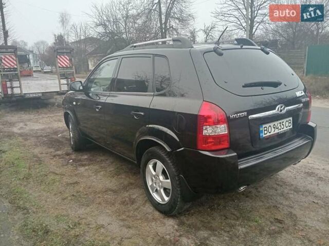 Черный Хендай Туксон, объемом двигателя 1.99 л и пробегом 235 тыс. км за 9000 $, фото 4 на Automoto.ua