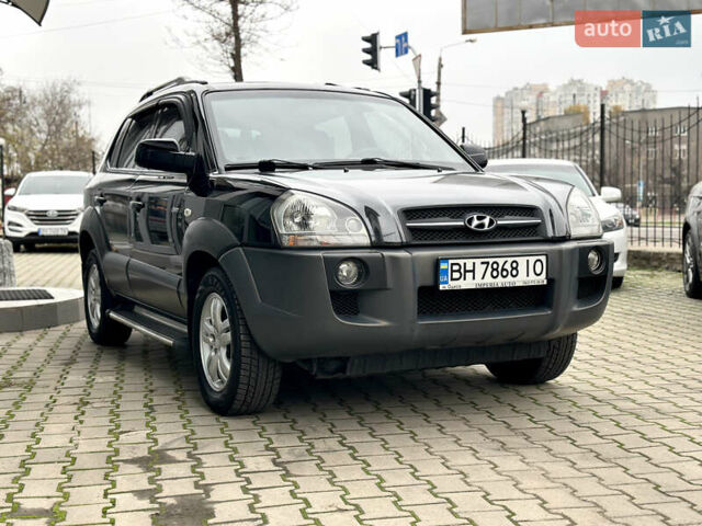 Чорний Хендай Туксон, об'ємом двигуна 2.66 л та пробігом 145 тис. км за 8900 $, фото 6 на Automoto.ua