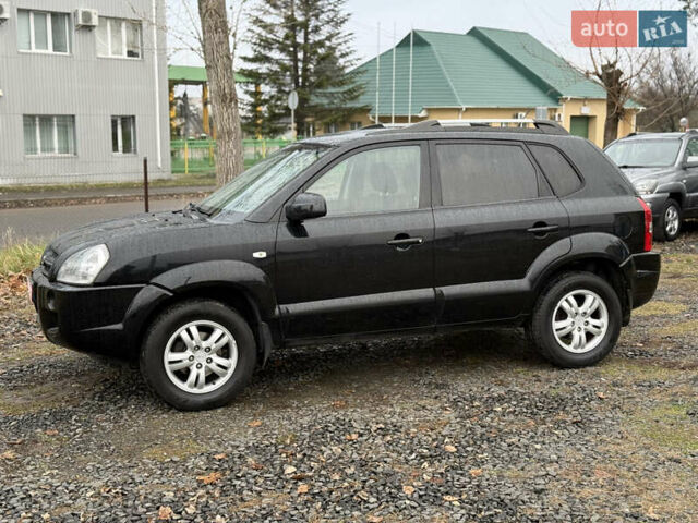 Чорний Хендай Туксон, об'ємом двигуна 2 л та пробігом 196 тис. км за 7250 $, фото 9 на Automoto.ua