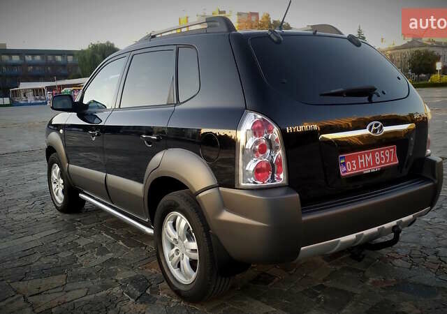 Черный Хендай Туксон, объемом двигателя 2 л и пробегом 230 тыс. км за 8600 $, фото 14 на Automoto.ua