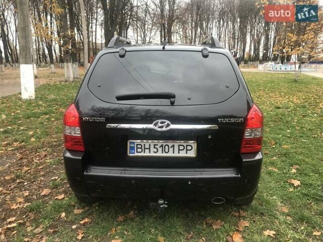 Черный Хендай Туксон, объемом двигателя 2 л и пробегом 210 тыс. км за 8999 $, фото 23 на Automoto.ua