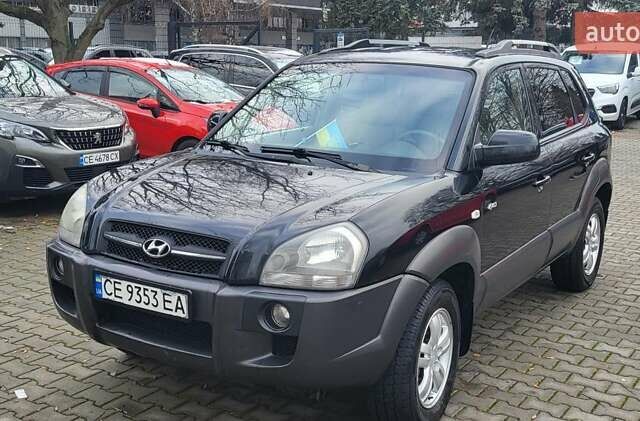 Черный Хендай Туксон, объемом двигателя 2 л и пробегом 230 тыс. км за 7700 $, фото 3 на Automoto.ua