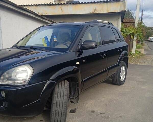 Чорний Хендай Туксон, об'ємом двигуна 1.99 л та пробігом 229 тис. км за 8199 $, фото 8 на Automoto.ua