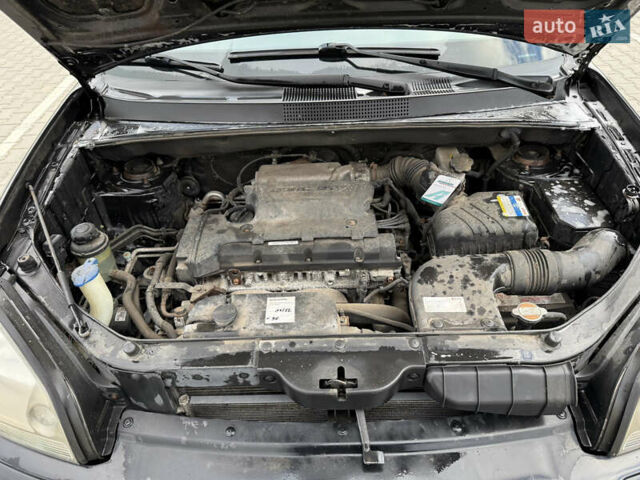 Черный Хендай Туксон, объемом двигателя 2 л и пробегом 182 тыс. км за 6999 $, фото 16 на Automoto.ua