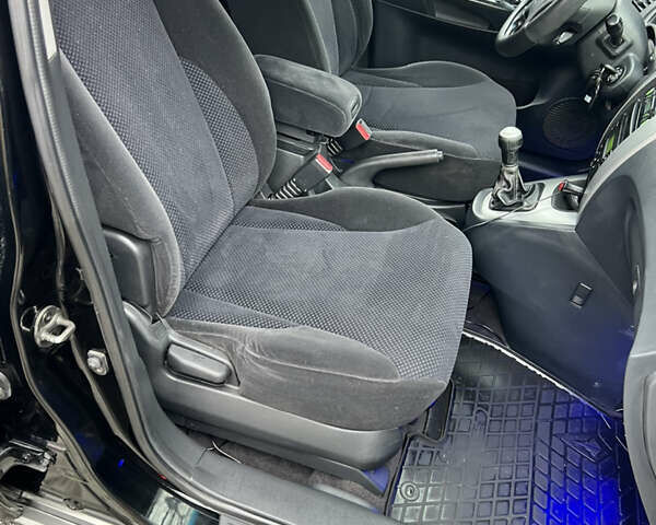 Чорний Хендай Туксон, об'ємом двигуна 1.98 л та пробігом 155 тис. км за 8750 $, фото 11 на Automoto.ua