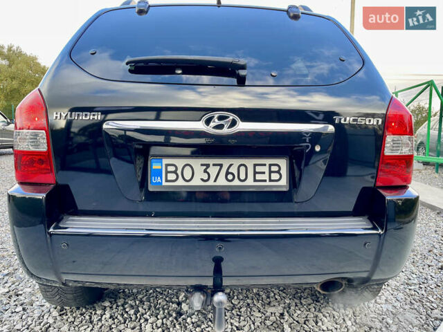 Черный Хендай Туксон, объемом двигателя 2 л и пробегом 224 тыс. км за 7750 $, фото 9 на Automoto.ua
