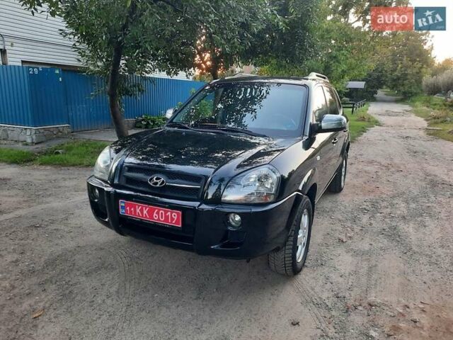 Черный Хендай Туксон, объемом двигателя 2 л и пробегом 219 тыс. км за 7990 $, фото 18 на Automoto.ua