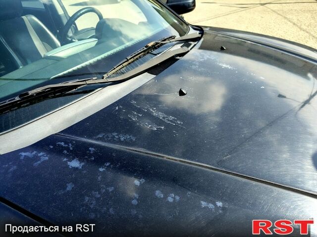 Чорний Хендай Туксон, об'ємом двигуна 2 л та пробігом 350 тис. км за 7500 $, фото 1 на Automoto.ua