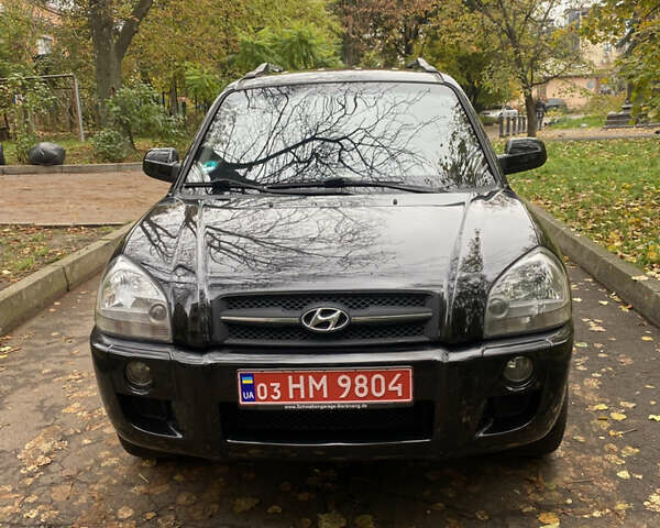 Черный Хендай Туксон, объемом двигателя 2 л и пробегом 178 тыс. км за 7860 $, фото 8 на Automoto.ua