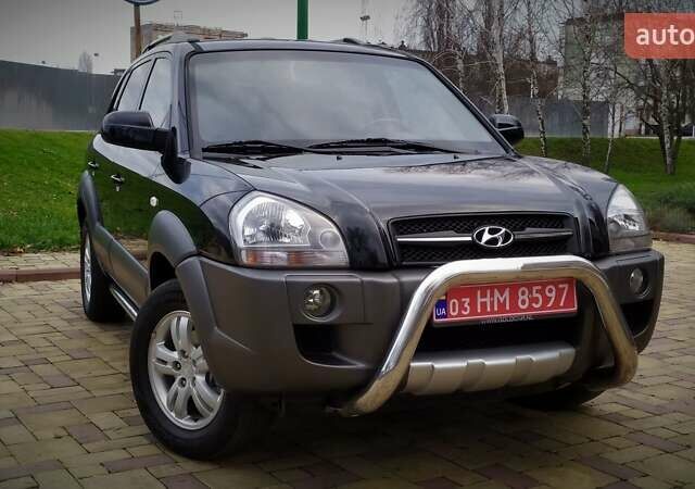 Черный Хендай Туксон, объемом двигателя 2 л и пробегом 200 тыс. км за 8500 $, фото 39 на Automoto.ua