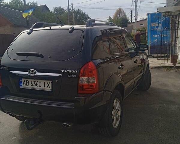 Чорний Хендай Туксон, об'ємом двигуна 1.99 л та пробігом 229 тис. км за 8199 $, фото 5 на Automoto.ua