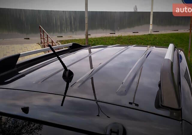 Чорний Хендай Туксон, об'ємом двигуна 2 л та пробігом 229 тис. км за 8600 $, фото 74 на Automoto.ua