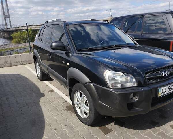 Черный Хендай Туксон, объемом двигателя 2 л и пробегом 158 тыс. км за 7500 $, фото 12 на Automoto.ua