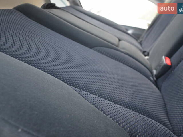 Черный Хендай Туксон, объемом двигателя 2 л и пробегом 183 тыс. км за 9150 $, фото 48 на Automoto.ua