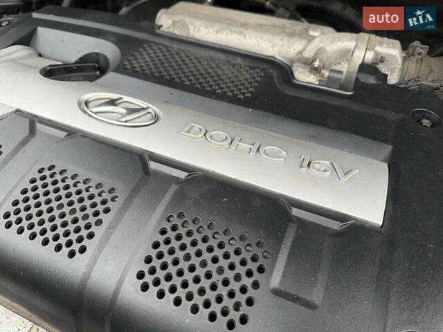 Чорний Хендай Туксон, об'ємом двигуна 2 л та пробігом 196 тис. км за 7250 $, фото 27 на Automoto.ua