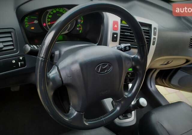 Чорний Хендай Туксон, об'ємом двигуна 2 л та пробігом 229 тис. км за 8600 $, фото 121 на Automoto.ua