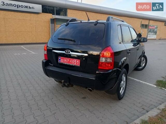 Чорний Хендай Туксон, об'ємом двигуна 1.98 л та пробігом 192 тис. км за 7950 $, фото 10 на Automoto.ua