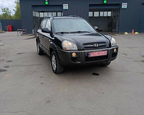 Черный Хендай Туксон, объемом двигателя 2 л и пробегом 255 тыс. км за 8400 $, фото 9 на Automoto.ua