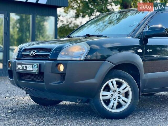 Черный Хендай Туксон, объемом двигателя 2 л и пробегом 227 тыс. км за 8200 $, фото 10 на Automoto.ua