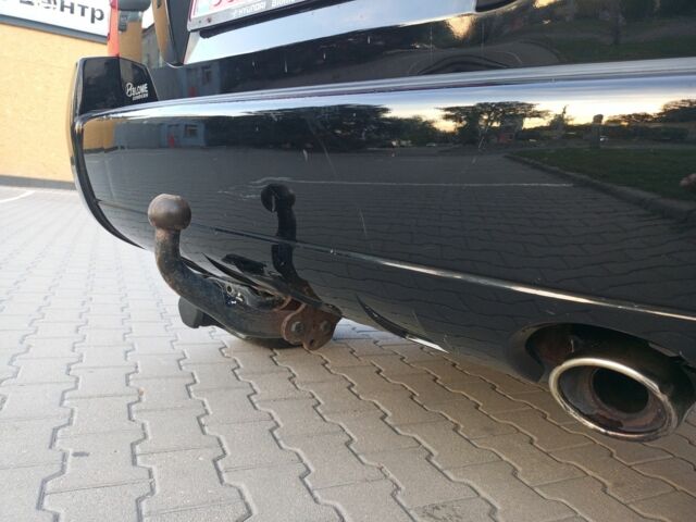 Черный Хендай Туксон, объемом двигателя 2 л и пробегом 192 тыс. км за 7950 $, фото 13 на Automoto.ua