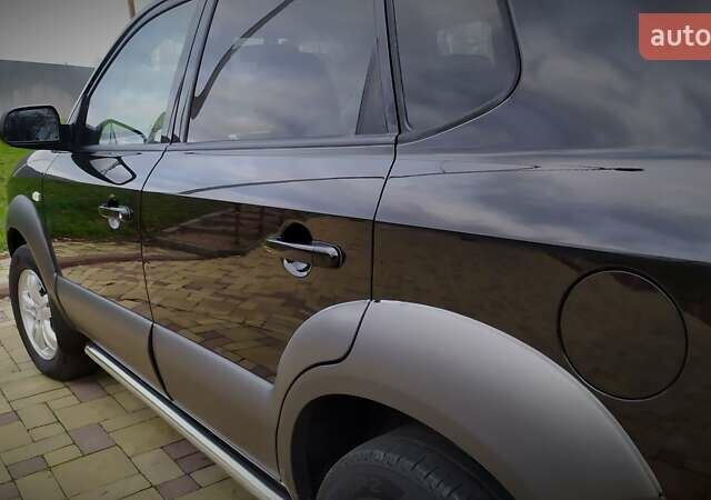 Чорний Хендай Туксон, об'ємом двигуна 2 л та пробігом 229 тис. км за 8600 $, фото 84 на Automoto.ua